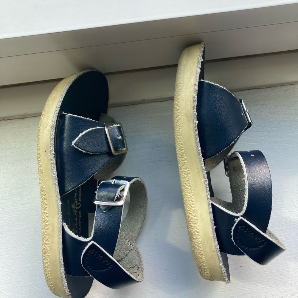 Little girls leather sandals that go in water too.